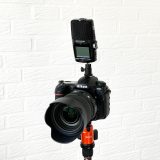 Connect Zoom H2n audio recorder to DSLR camera and use as microphone.