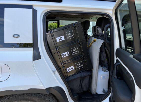 Labelled transport boxes and crates in the off-road vehicle